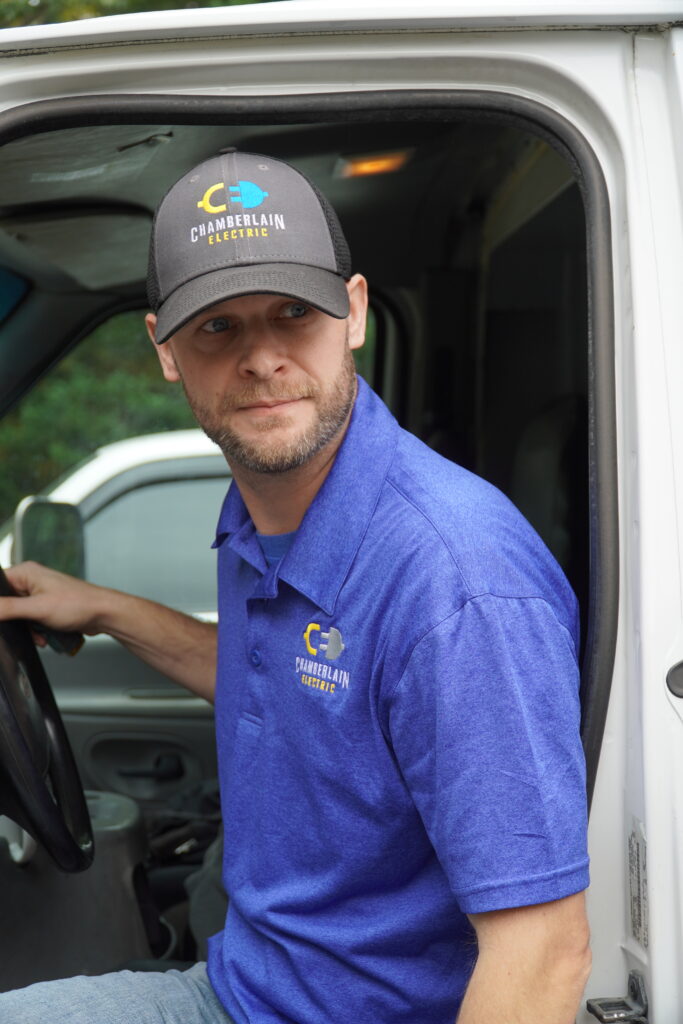 Chamberlain employee exiting work vehicle