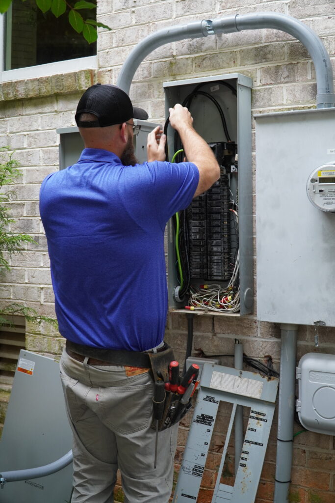 A generator installation technician working in Durham, NC